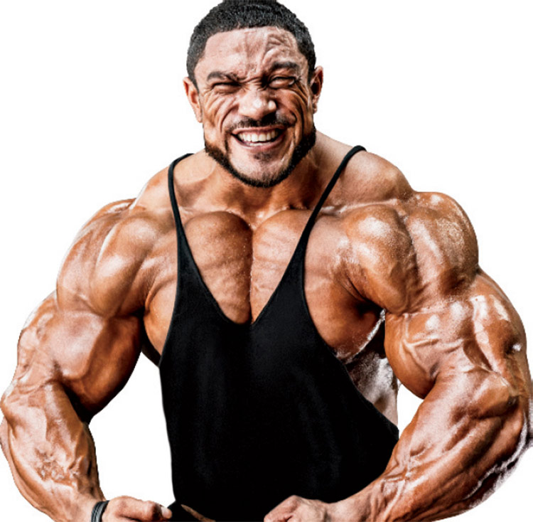 Roelly WInklaar in the full muscular pose, displaying his shredded physique. 