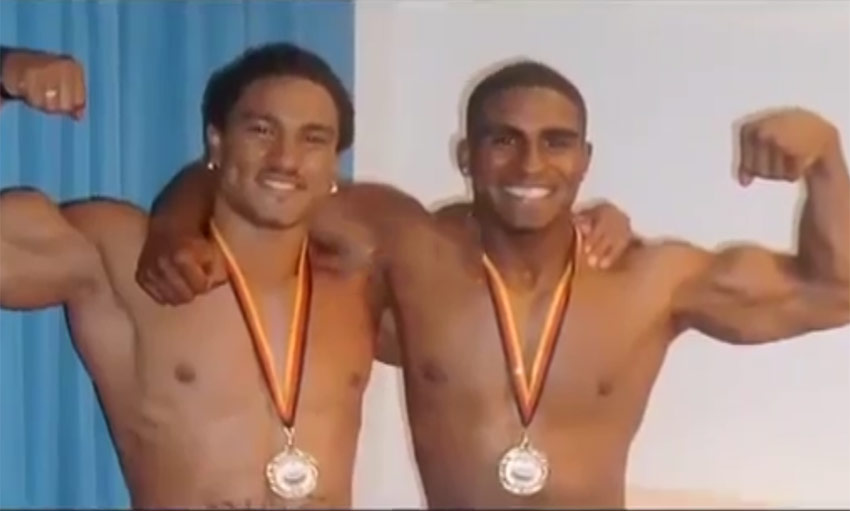 Roelly posing with his brother, Quincy WInklaar, before the car crash.