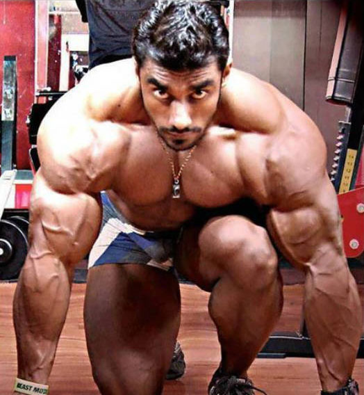 Sangram Chougule kneeling down