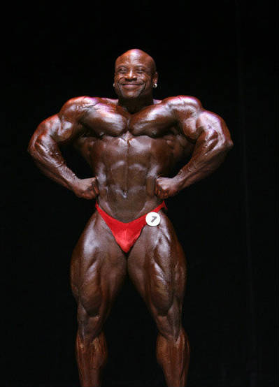 Charles Dixon competing in red trunks 