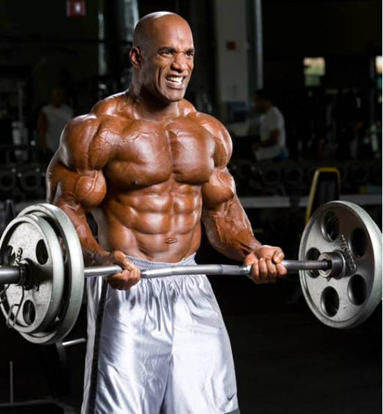 Darrem Charles completing a barbell bicep curl