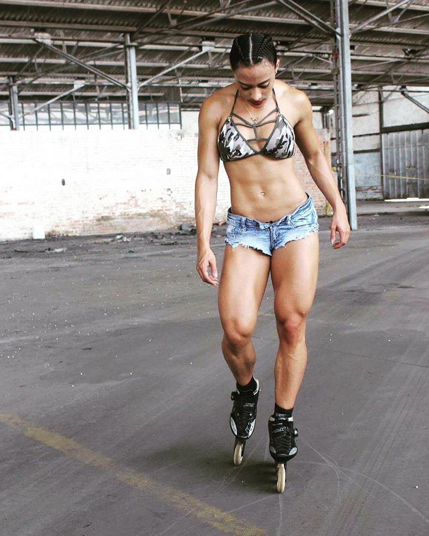 Jessica Olaya wearing roller skates looking ripped and lean 