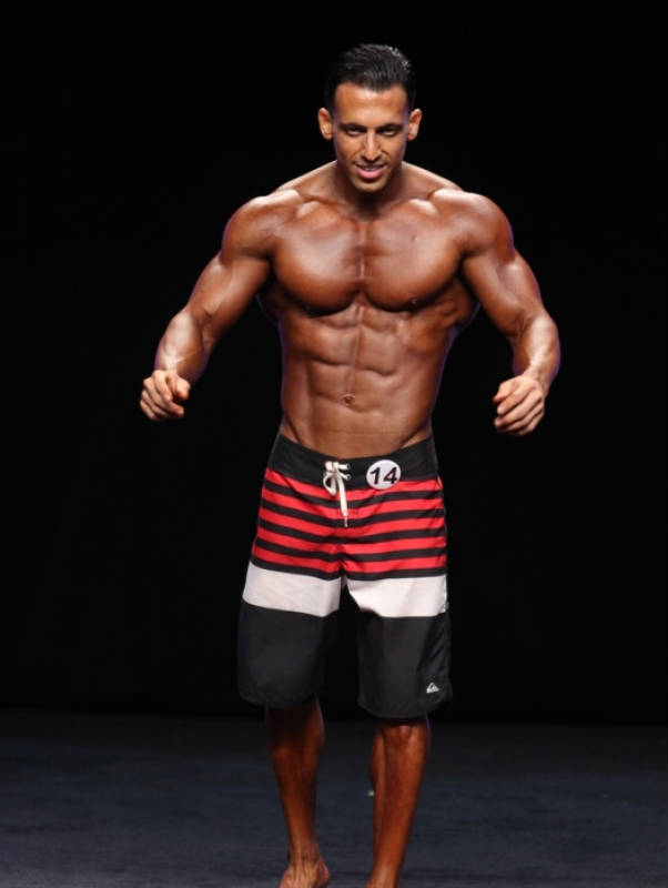 arya saffaie competing in black swim shorts