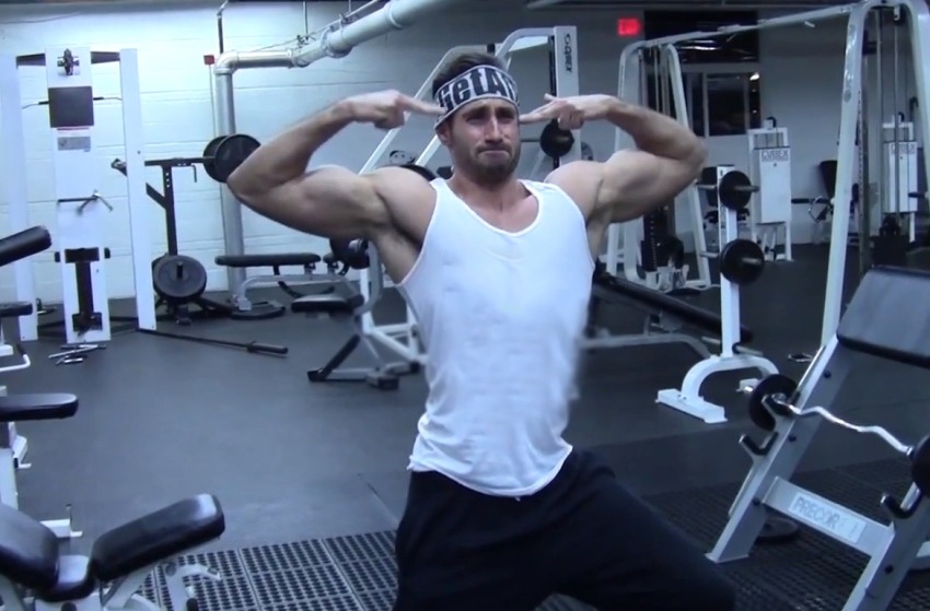 Dom Mazzetti doing silly posing in the gym