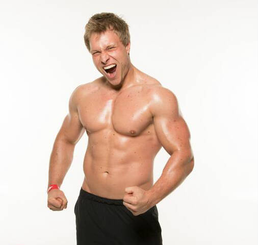 furious pete tensing his arms topless