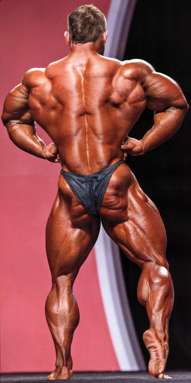 James Fles Lewis showing rear lat spread pose on the stage
