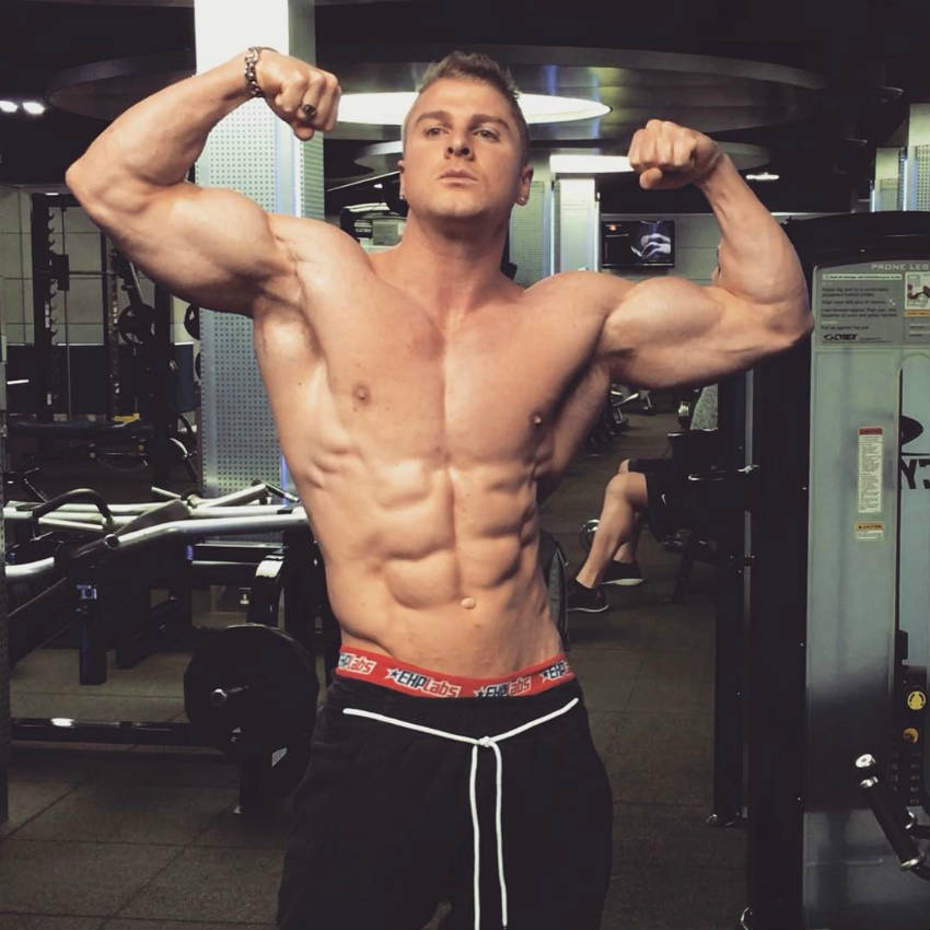 josef rakich posing in the gym