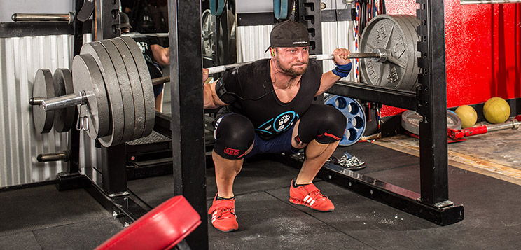 Layne Norton doing heavy squats