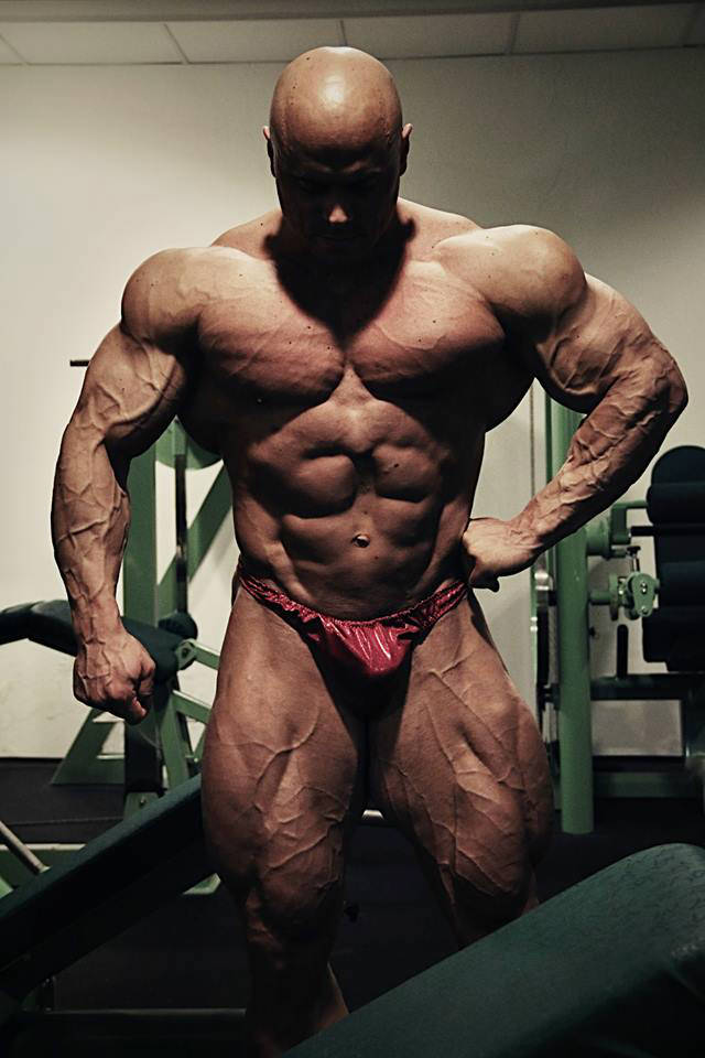 lukas osladil in dark room looking down