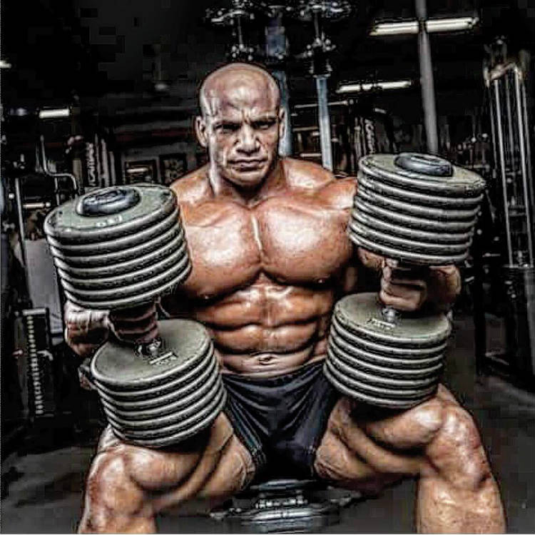 mamdouh with large dumbbells