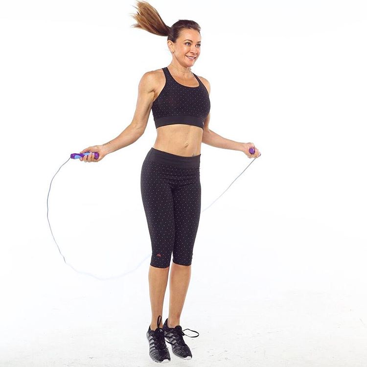 Michelle Bridges having a rope skipping workout, performing single unders