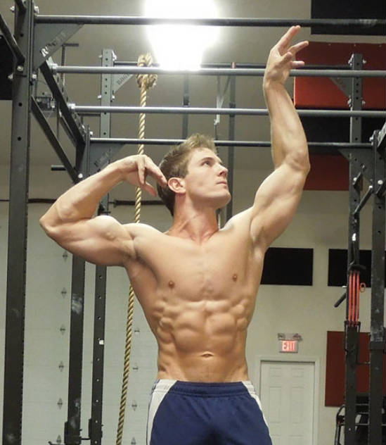 scott herman standing in an olympia pose