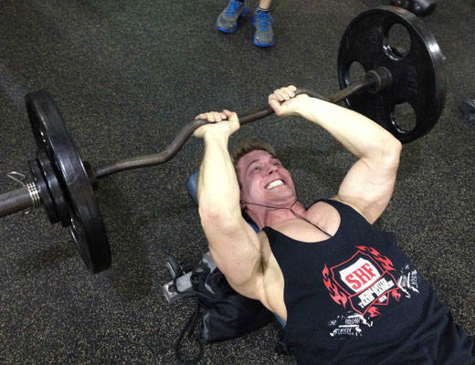 scott herman working out with barbell