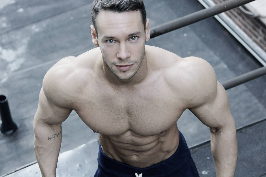 Anton Antipov from above with his delts, traps and abs visible