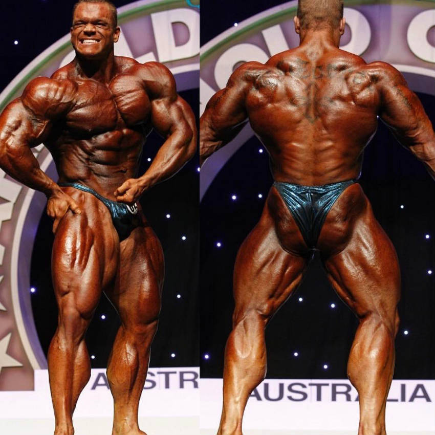 Dallas Mccarver showing his front and back profile, displaying his v-taper, large delts, quads and calves