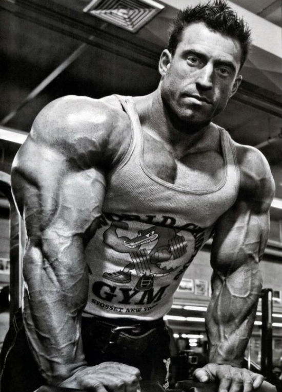 Erik Fankhouser showing his large arms and large traps