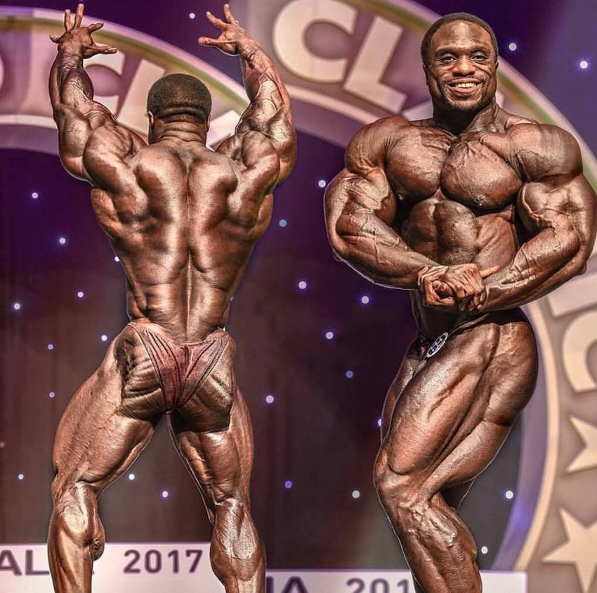 Michael Lockett in two different poses on the stage, one side chest, and the other back pose, having incredible conditioning