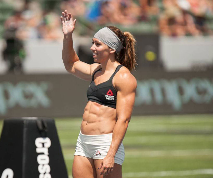 Miranda Oldroyd waving to the crowd in a Crossfit competition 