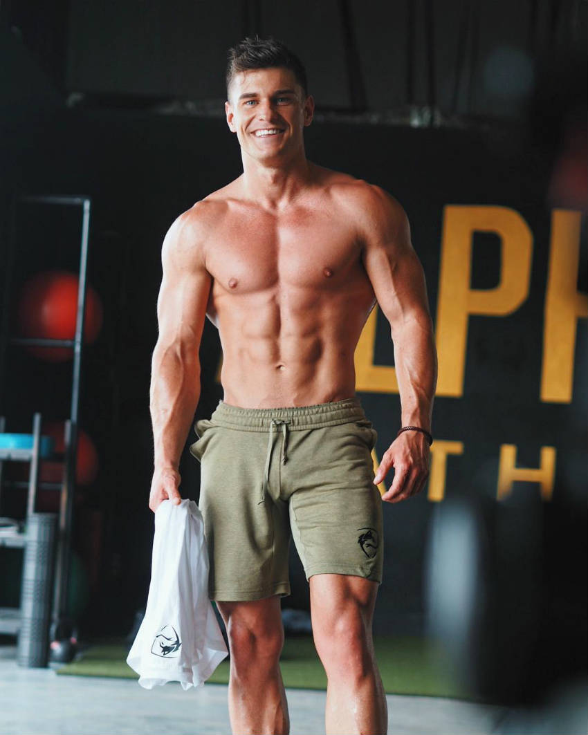 Rob Lipsett showing his full body, including his ripped abs and vascular arms