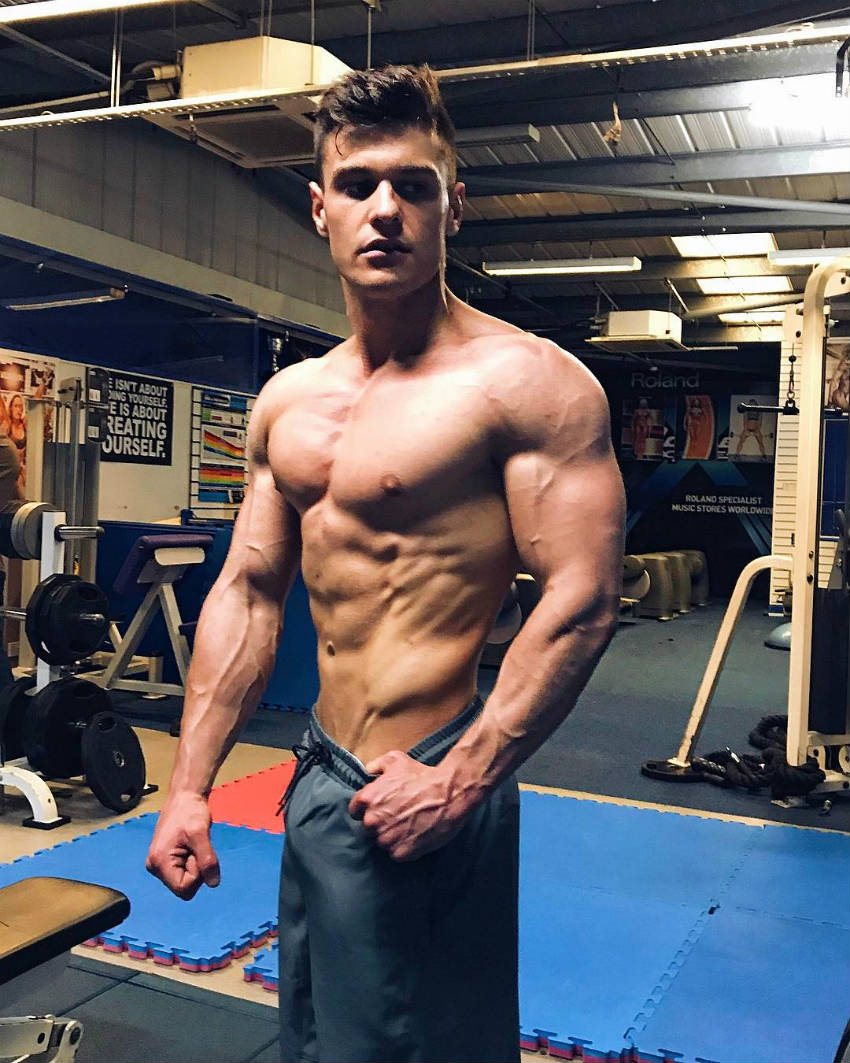 Rob Lipsett showing his oblique definition at the gym 