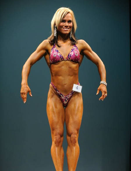 Allison Ethier showing her toned physique at a competition