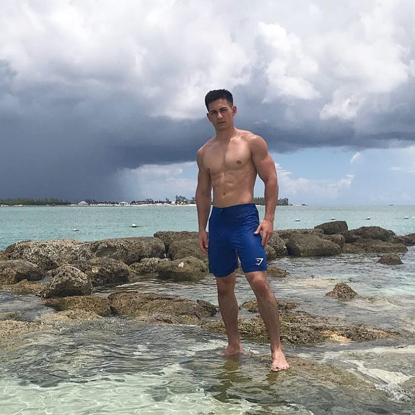 FaZe Censor standing in the shallow sea, looking lean and healthy