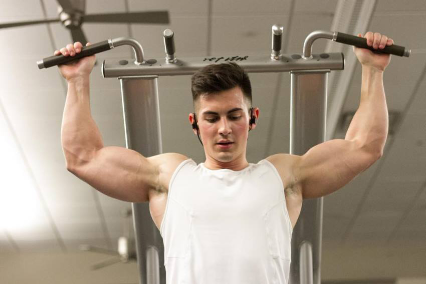 FaZe Censor doing pull ups behind the neck, his biceps popping out and look...