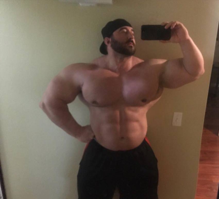 Craig Golias taking a selfie of his huge physique