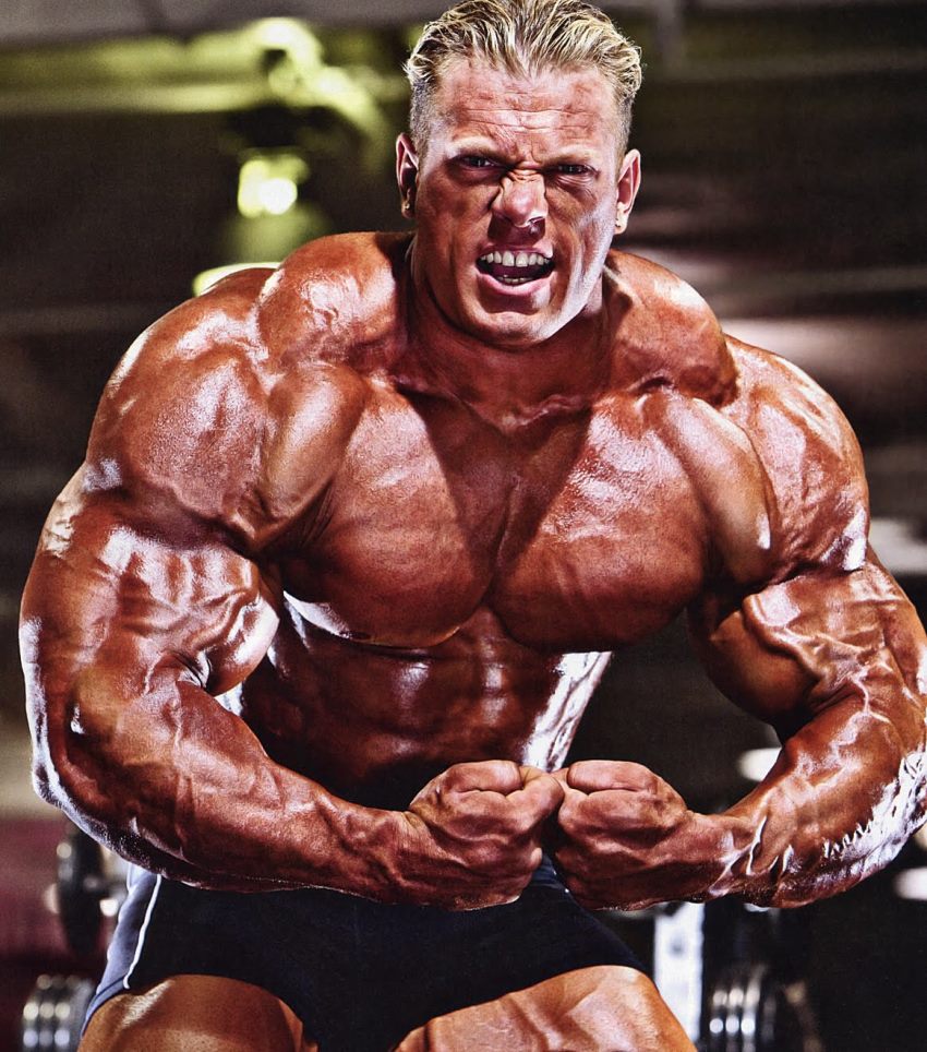 Dennis Wolf doing most muscular pose, looking extremely conditioned