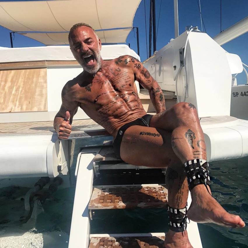 Gianluca Vacchi laughing at the camera, looking lean and healthy