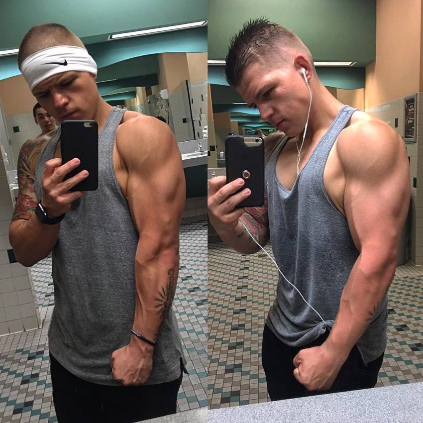 ObesetoBeast taking a selfie of his flexed triceps in the mirror