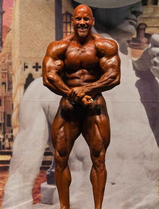 Stan Efferding posing on the bodybuilding stage