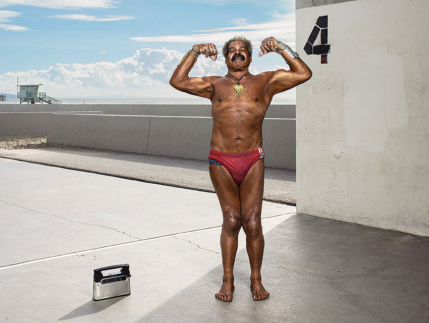 Bill Pettis flexing his muscles wearing speedos later in his life.
