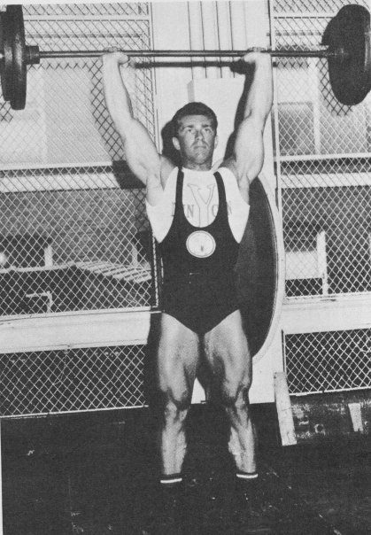 Bob Gajda doing an overhead press