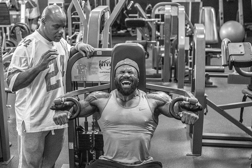Gerald Williams working out on the chest press machine.