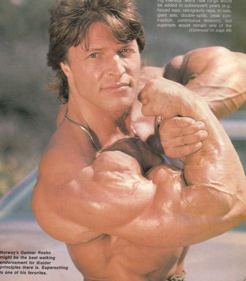 Gunnar Rosbo flexing his massive arms and shoulders