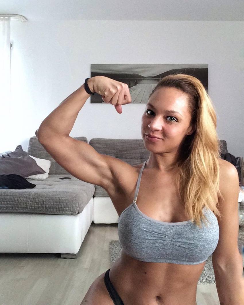 Ramona Valerie Alb flexing her biceps