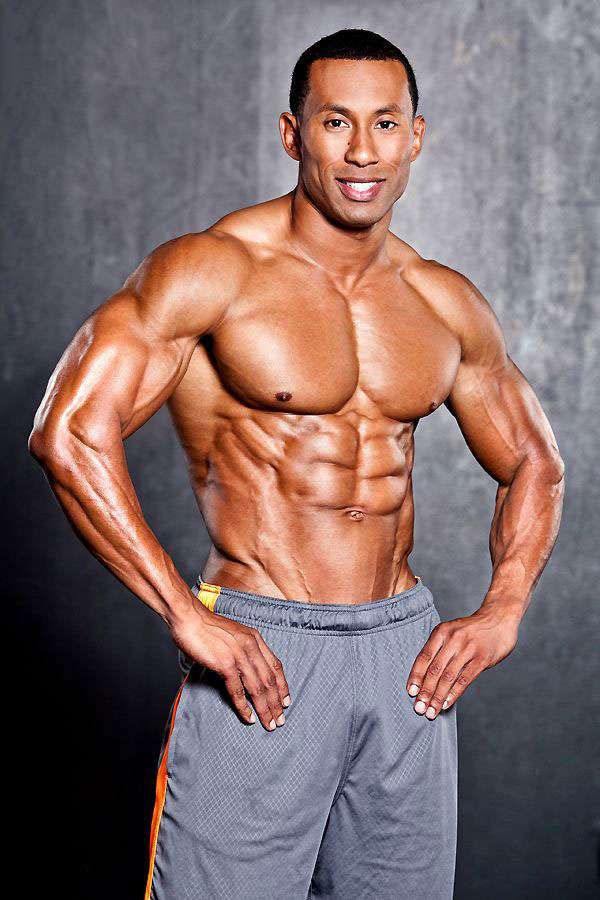 AJ Ellison showing off his physique in a photo shoot.