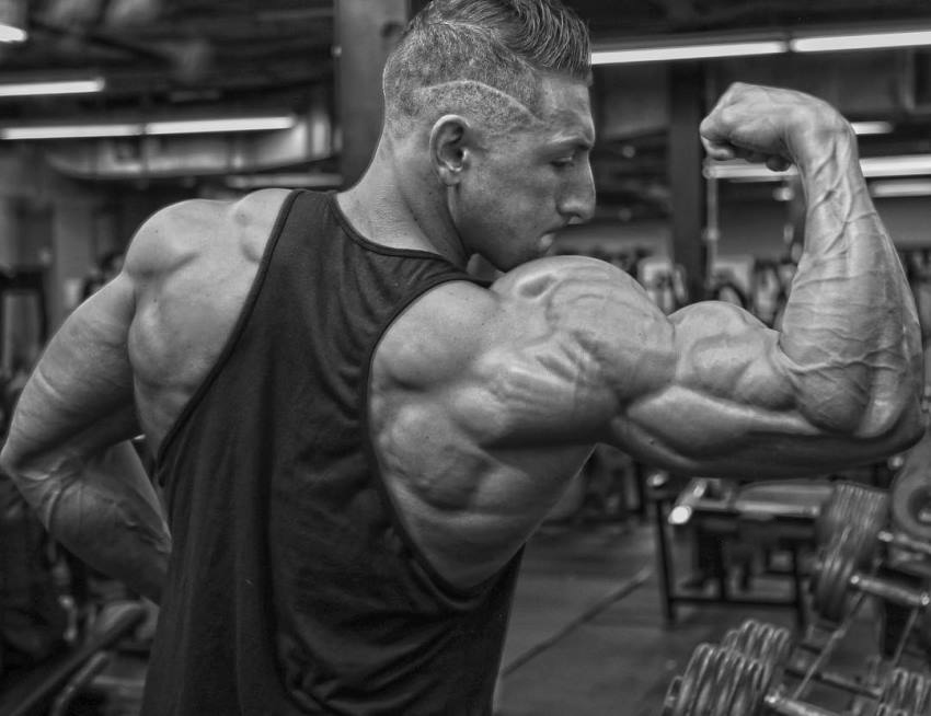 Anthony Scalza flexing his massive and ripped arm