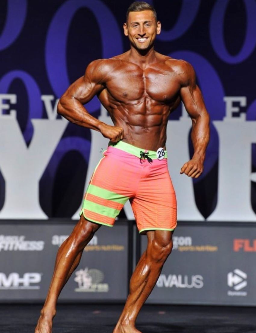 Anthony Scalza on the Men's Physique bodybuilding stage