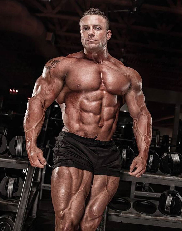 Brad Rowe showing off his physique in a photo shoot.