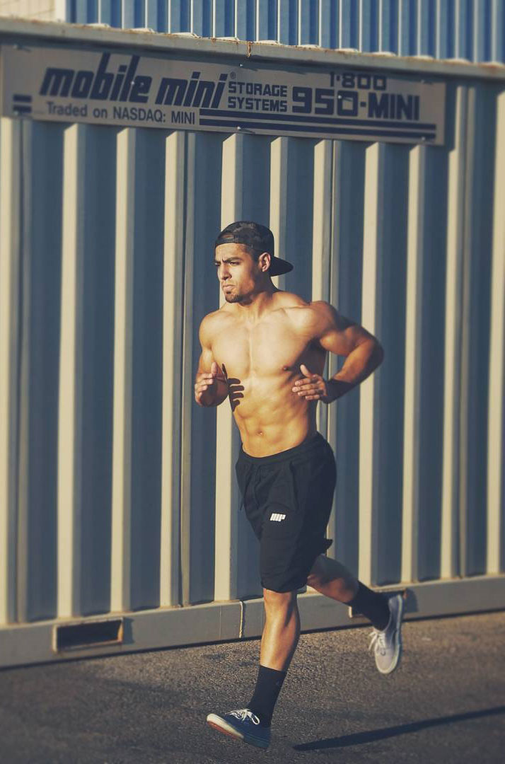 Chris Lavado running in a photo shoot.