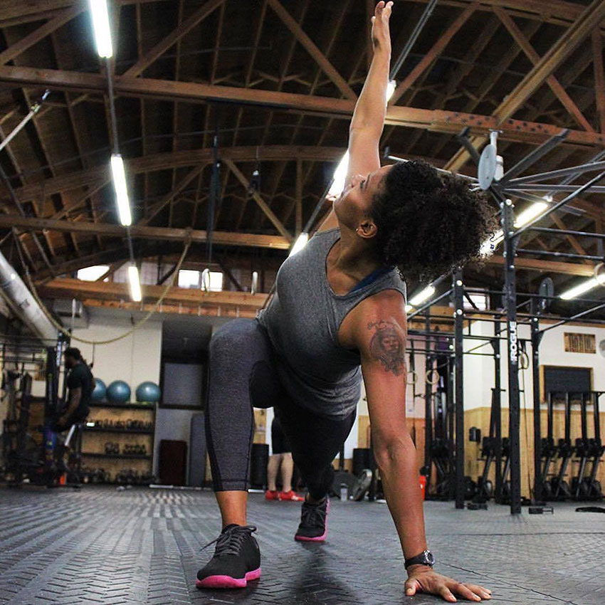 Elizabeth Akinwale exercising in the gym.