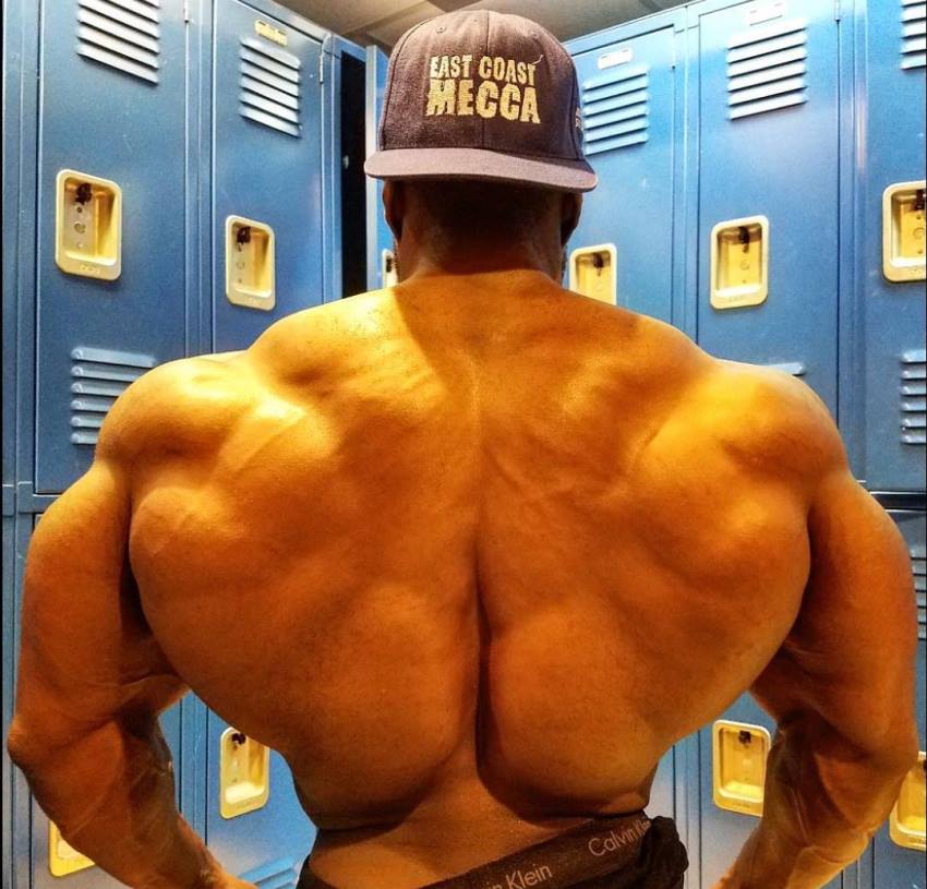 George Peterson showing off his massive and muscular back