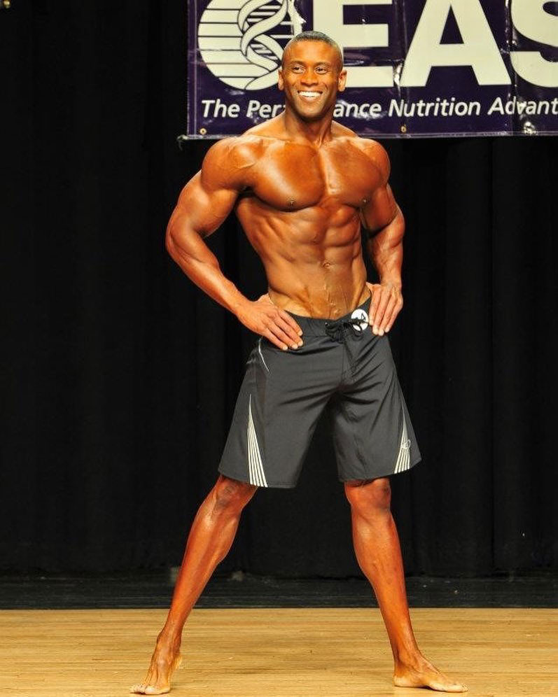 Michael Anderson posing on stage.