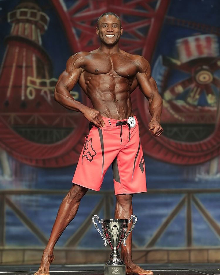 Michael Anderson posing on stage.