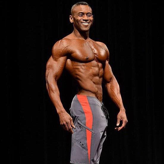 Michael Anderson posing on stage.
