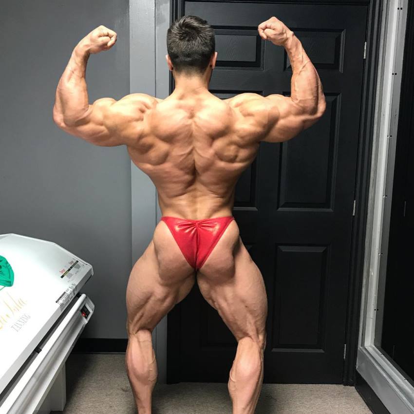 Regan Grimes doing a back double biceps flex