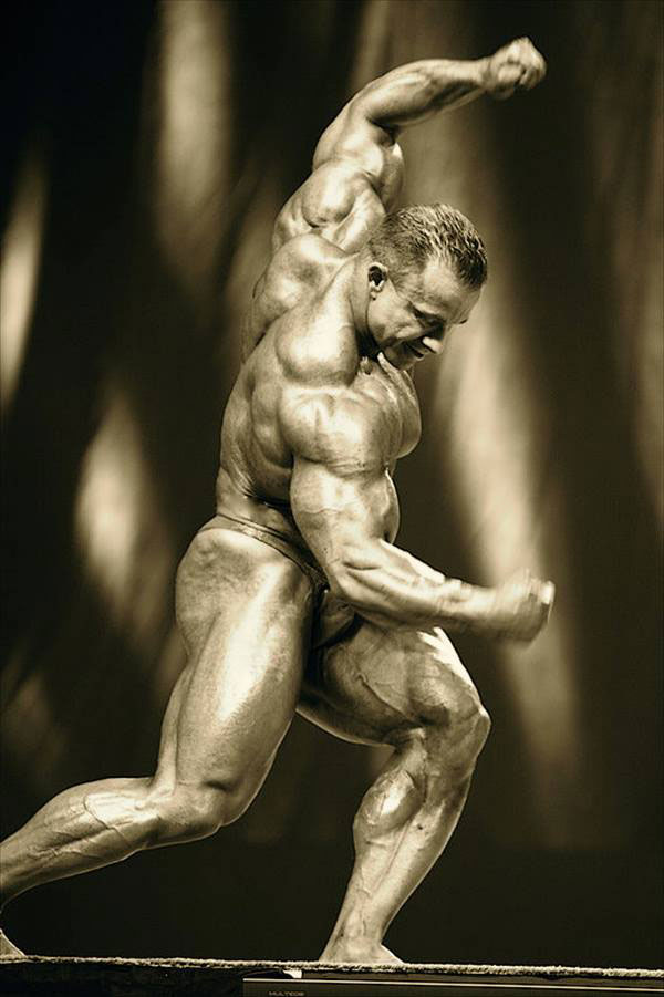 Ronny Rockel posing on stage.