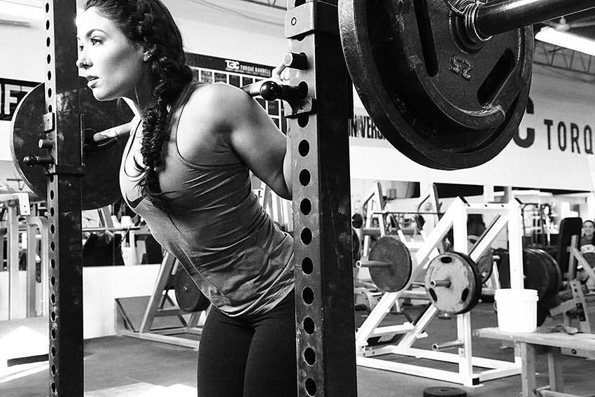 Karina Baymiller training with a barbell.